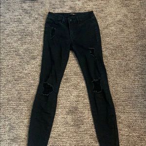 Black distressed skinny jeans